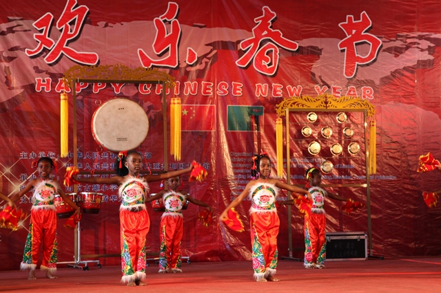 Zambian students dance during the temple fair held in Lusaka Zambia Jan. 24 2016. The temple fair was held on Sunday to celebrate the upcoming Chinese Spring Festival in Lusaka