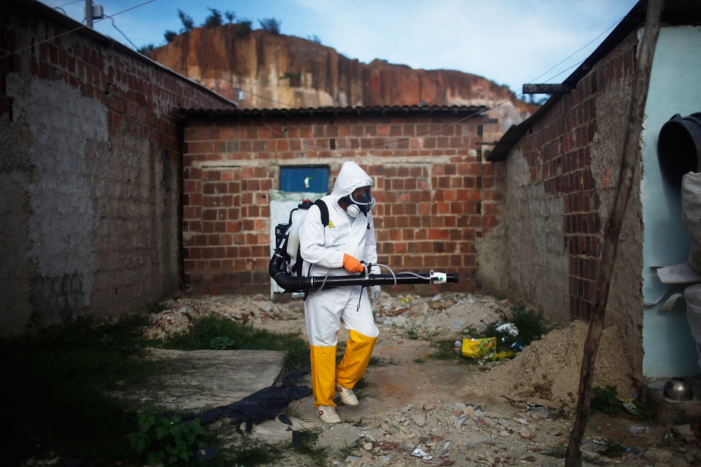 RECIFE BRAZIL- FEBRUARY 04 A city worker fumigates in an effort to eradicate the mosquito which transmits the Zika virus