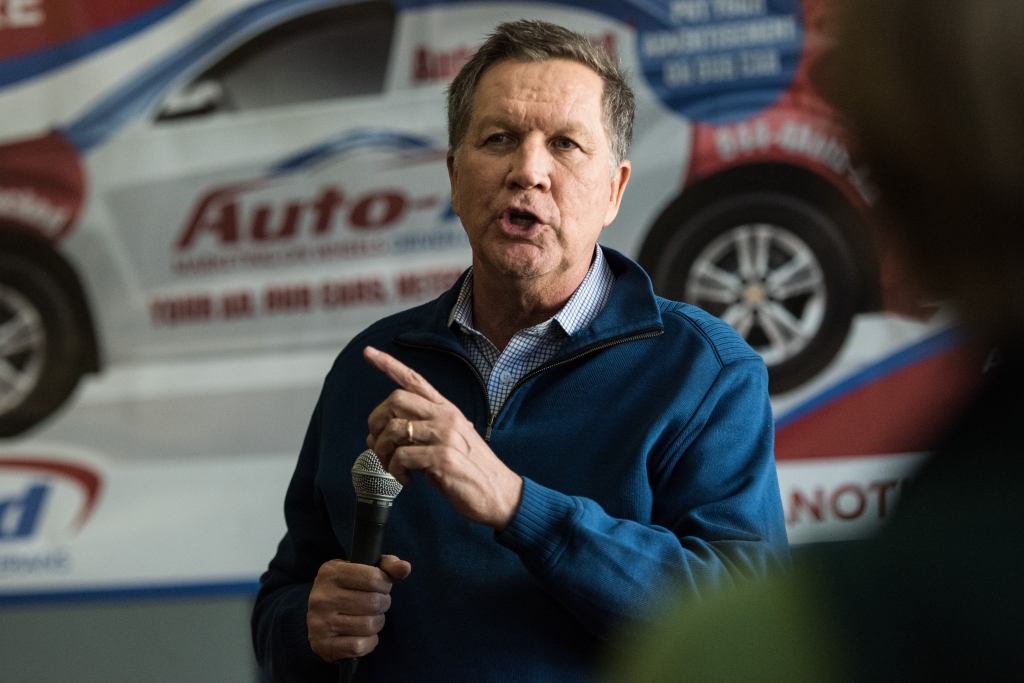 CHARLESTON SC- FEBRUARY 10 Republican presidential candidate Ohio Gov. John Kasich talks to the crowd at the Auto Ad agency