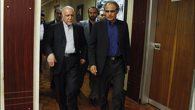 Oman's Oil Minister Mohammad bin Hamad bin Saif al Rumhi and his Iranian counterpart Bijan Zangeneh leave a meeting in Tehran Nov. 22 2015