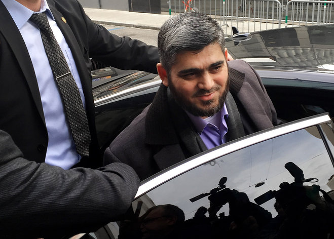 Army of Islam official Mohammed Alloush gets in to a car heading to a meeting with the opposition's High Negotiations Committee in Geneva Switzerland Tuesday Feb. 2 2016. Ahrar al Sham and the Army of Islam two Islamic groups fighting to overthrow