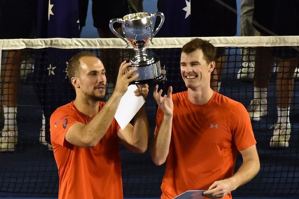 Paul Crock  AFP

Jamie Murray and Bruno Soares lift the Australian Open title