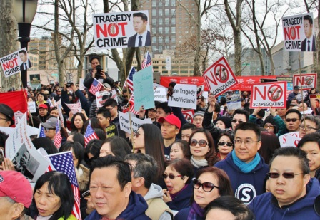 About 10,000 protesters many of them Chinese-Americans rally in New York on Saturday in support of former police officer Peter Liang who was convicted of the 2014 fatal shooting of an unarmed man in a public housing building. [Xie Yunan  For China Daily