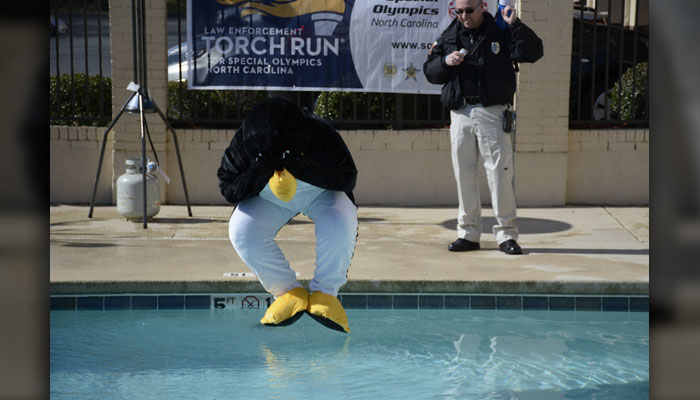 Crews load truck for Polar Plunge setup