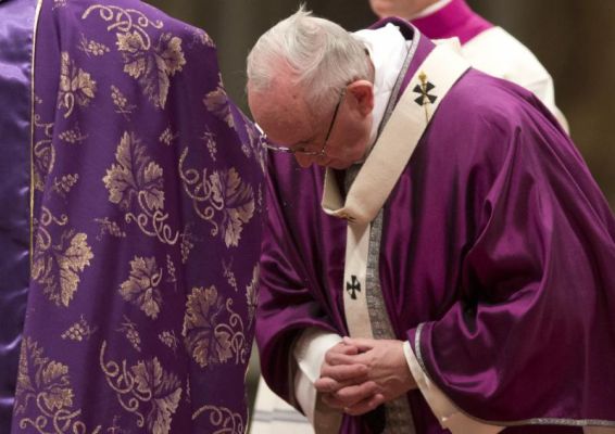 Pope Francis receives the ashes during the Ash