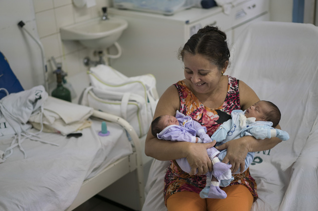 Severina Raimunda holds her granddaughter Melisa Vitoria left who was born with microcephaly and her twin brother Edison Junior at the IMIP hospital in Rec