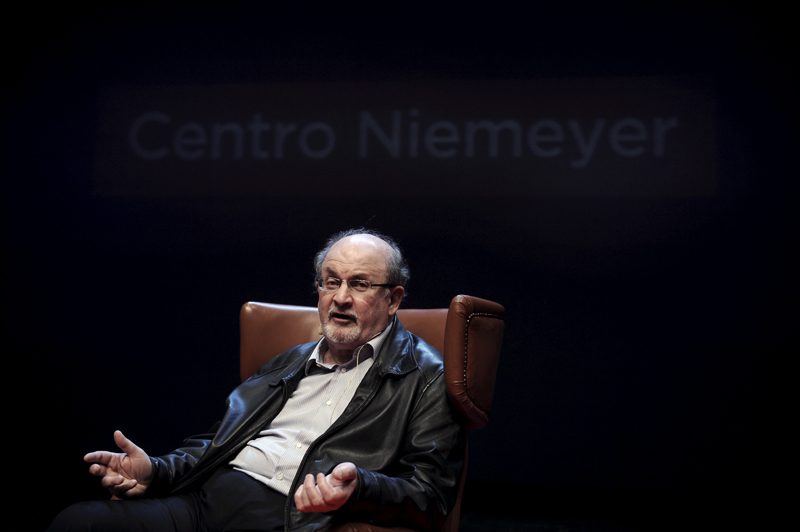 Author Salman Rushdie gestures during a news conference before the presentation of his latest book'Two Years Eight Months and Twenty Eight Nights at the Niemeyer Center in Aviles northern Spain