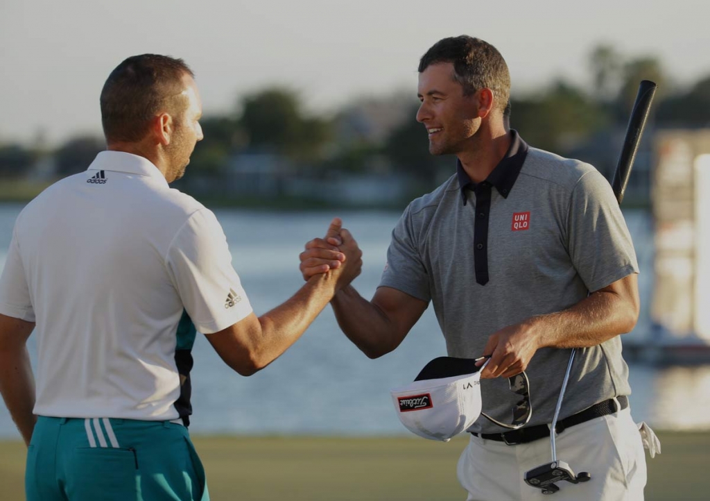 Sergio Garcia of Spain left shakes hands with Adam Scott of Australia right after the third round of the Honda Classic golf tournament Saturday Feb. 27 2016 in Palm Beach Gardens Fla