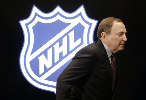 NHL commissioner Gary Bettman walks onto the stage for a news conference before the NHL hockey All Star game skills competition Saturday Jan. 30 2016 in Nashville Tenn