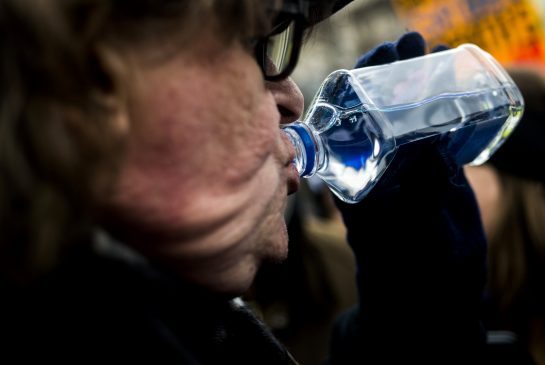 Filmmaker Michael Moore attends a rally outside city hall in Flint Mich. accusing Gov. Rick Snyder of poisoning the city's water. He’s also laying some of the blame for his hometown’s water woes on Toronto