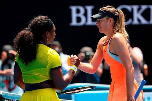 MELBOURNE AUSTRALIA- JANUARY 26 Maria Sharapova of Russia congratulates Serena Williams of the United States on winning their quarter final match during day nine of the 2016 Australian Open at Melbourne Park