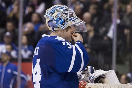 Toronto Maple Leafs goaltender James Reimer reacts during a break in the first period of Toronto's NHL hockey game against the Nashville Predators on Tuesday Feb. 23 2016 in Toronto