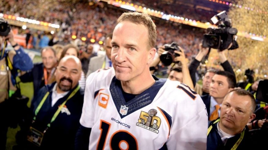 SANTA CLARA CA- FEBRUARY 07 Peyton Manning of the Denver Broncos walks through the crowd as the confetti flies after the Broncos win. The Denver Broncos played the Carolina Panthers in Super Bowl 50 at Levi's Stadium in Santa Clara Calif.