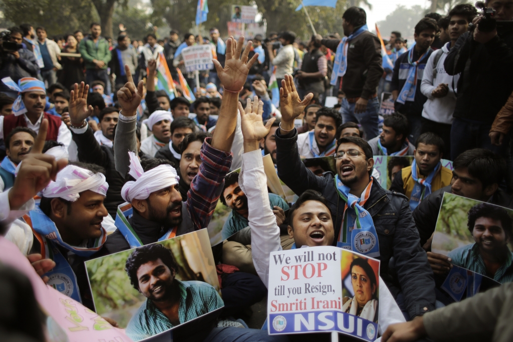 Members of the National Students Union of India, the student wing of India's main opposition Congress party shout slogans during a protest against the death of Rohith Vemula in New Delhi India Friday Jan. 22 2016. The students were protesting