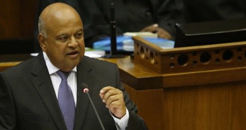 South Africa's finance minister Pravin Gordhan delivers the annual Budget speech in Parliament at Cape Town Wednesday Feb. 24 2016. Thousands of South Africans listened to the 2016 budget speech shown live on local television networks