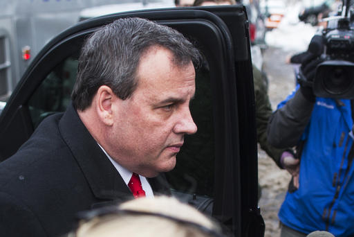 Republican presidential candidate N.J. Governor Chris Christie exits his SUV outside the polling place at Webster School on Feb. 9 2016 in Manchester N.H