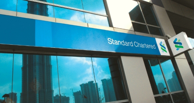 Standard Chartered reports $1.5bn loss in 2015