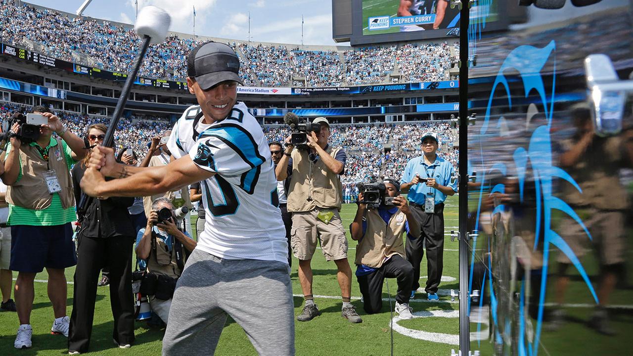 Stephen Curry prepares to Pound the Drum before an NFL football game between the Carolina Panthers and the Houston Texans in Charlotte N.C. Sunday Sept. 20 2015