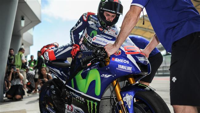 Movistar Yamaha MotoGP rider Jorge Lorenzo of Spain prepares to leave the pit lane during the second day of 2016 MotoGP pre-season test at the Sepang International circuit