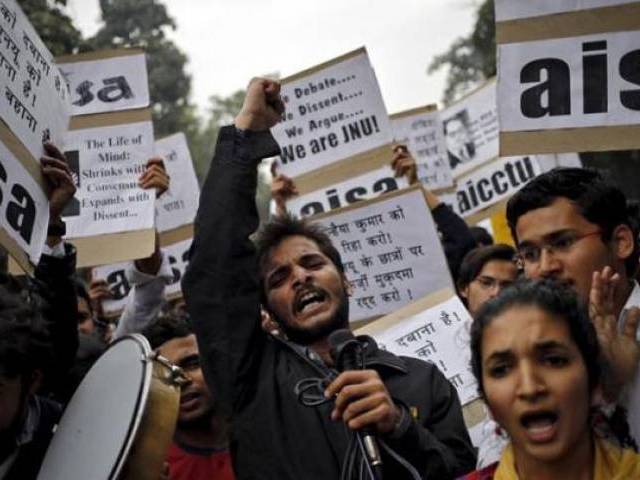 Demonstrators shout slogans as they hold placards during a protest demanding the release of Kanhaiya Kumar a Jawaharlal Nehru University student union leader accused of sedition in New Delhi India