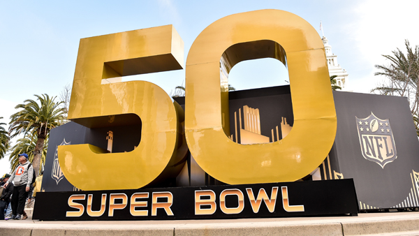 Super Bowl 50 signage is displayed around Super Bowl City