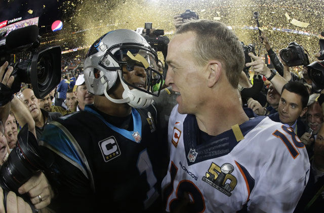 Denver Bronco'’ Peyton Manning right greets Carolina Panthers’ Cam Newton after the NFL Super Bowl 50 football game Sunday Feb. 7 2016 in Santa Clara Calif. The Broncos won 24-10