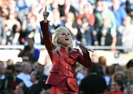 Lady Gaga performing the national anthem prior to the start of Super Bowl