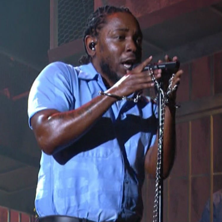 Watch Kendrick Lamars powerful performance at 2016 Grammys alright