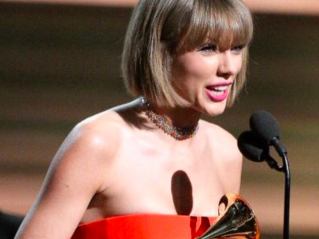 Shots Fired! Taylor Swift Shoots Subliminal Response To Kanye West During Grammys Speech