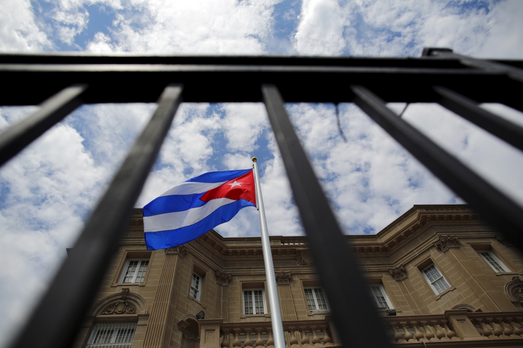 The Cuban flag was raised over Havana's embassy in Washington on Monday for the first time in 54 years as the United States and Cuba formally restored