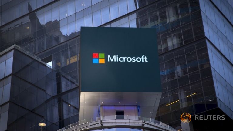 The Microsoft logo is seen on an electronic billboard on an office building in New York City