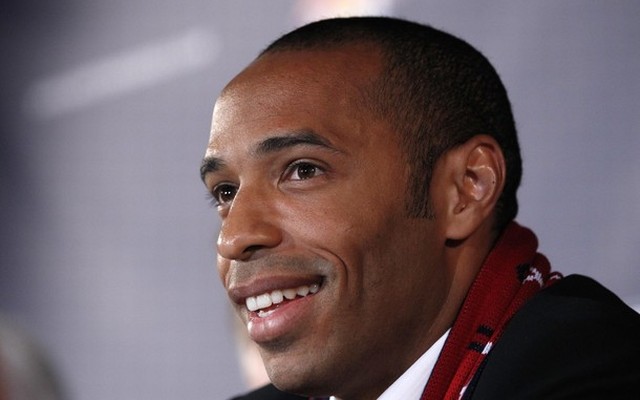 Thierry Henry believes Arsenal wingers must play more in their own half. Reuters file