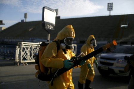 Municipal workers spray insecticide at Sambodrome in Rio de Janeiro Brazil