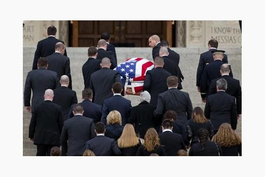 The casket containing the late Supreme Court Associate Justice Antonin Scalia arrives for a funeral mass at the Basilica of the National Shrine of the Immaculate Conception in Washington Saturday Feb. 20 2016