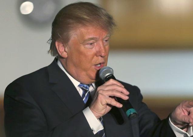 Republican presidential candidate Donald Trump answers a question during a campaign stop at an Elks Lodge in Salem New Hampshire on Monday