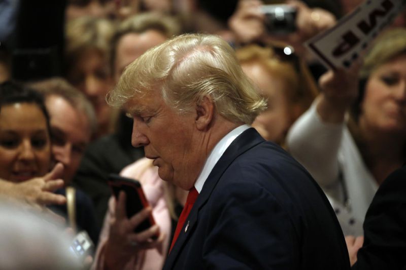 Republican presidential candidate Donald Trump meets with attendees during a campaign stop Friday Feb. 19 2016 in North Charleston S.C