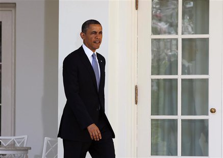 U.S. President Barack Obama walks out before he talks about the Fiscal Year 2014 Budget in the Rose Garden at the White House in Washington