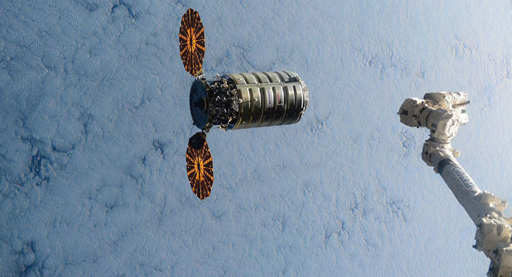 This image made available by NASA via Twitter shows the Cygnus spacecraft approaching the International Space Station on Wednesday Dec. 9 2015