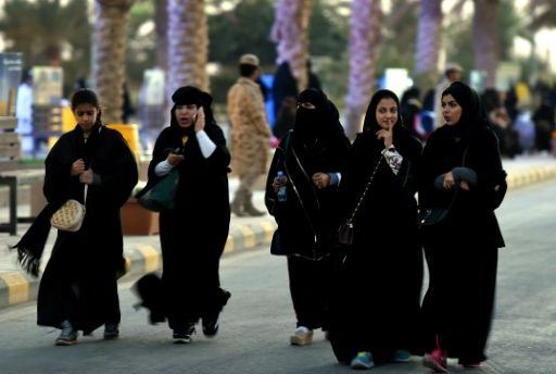 Saudi women arrive to attend the Janadriyah festival of Heritage and Culture