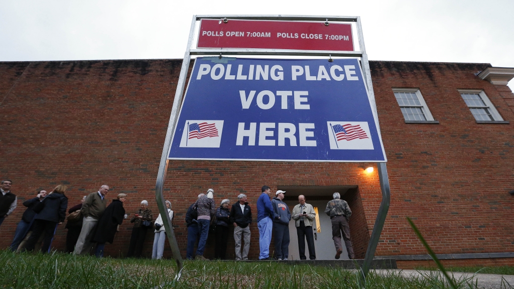 Voters wait in line for a polling place to open at Eastlan Baptist Church last Saturday in Greenville S.C