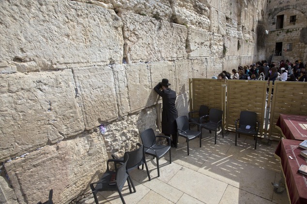 An ultra Orthodox Jewish man prays at the Western Wall the holiest site where Jews can pray in Jerusalem's Old City Monday Feb. 1 2016. The Israeli gover