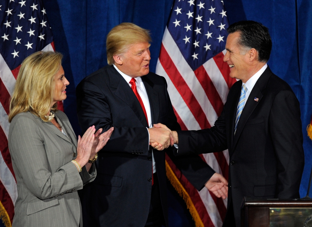 Trump shakes Romney's hand