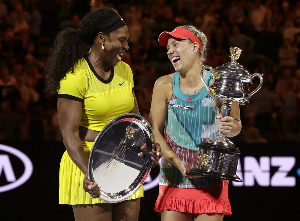 Angelique Kerber right of Germany enjoys a joke with runner-up Serena Williams of the United States after winning their women's singles final at the Australian Open tennis championships in Melbourne Australia Saturday Jan. 30 2016