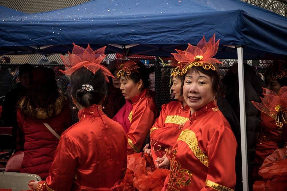 Dancers are ready to perform at the Chinese New Year celebrations at the Firecracker Ceremony in Sarah D. Roosevelt Park. Chinatown New York. 2016