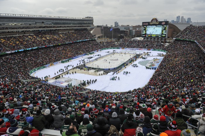 Fans watch the Minnesota Wild play Chicago Blackhawks at TCF Bank Stadium during an NHL Stadium Series hockey game Sunday Feb. 21 2016 in Minneapolis. The Wild won 6-1