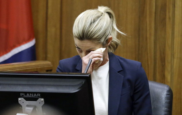 Sportscaster and television host Erin Andrews wipes her eyes as she testifies Monday Feb. 29 2016 in Nashville Tenn. Andrews has filed a $75 million laws