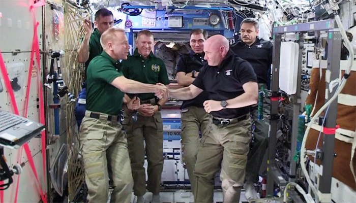 Watch Astronaut Tim Kopra assumes command of International Space Station from Scott Kelly