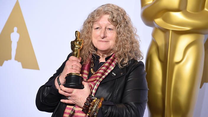 Jenny Beavan poses with the award for best costume design for Mad Max Fury Road in the press room at the Oscars