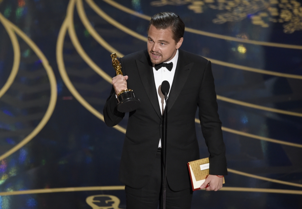 Leonardo Di Caprio accepts the award for best actor in a leading role for The Revenant at the Oscars on Sunday Feb. 28 2016 at the Dolby Theatre in Los Angeles