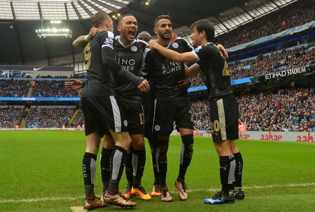 Riyad Mahrez celebrates with his Leicester team-mates after scoring against Manchester City